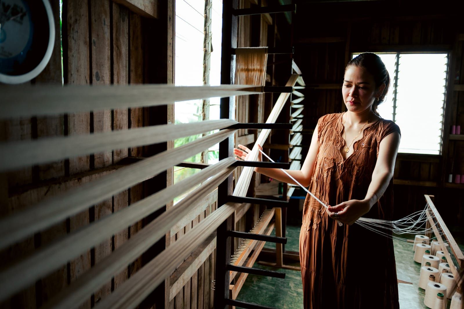 Bela Padilla learning to warp threads
