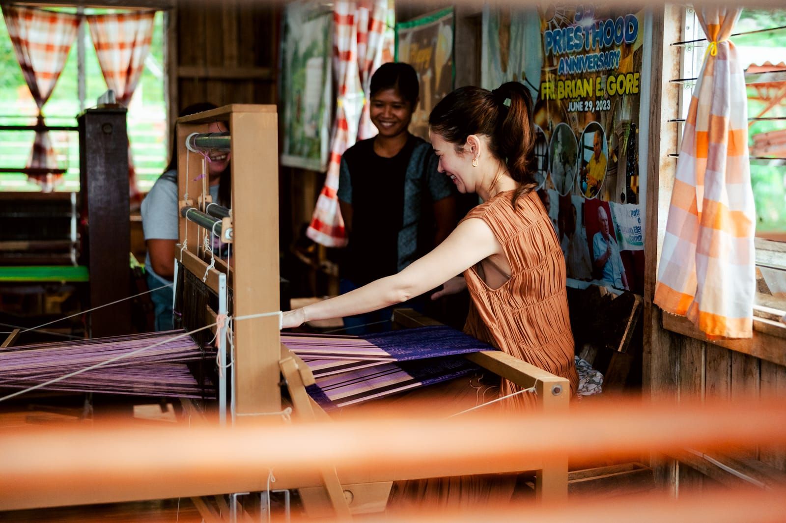 Bela Padilla weaving with purple threads