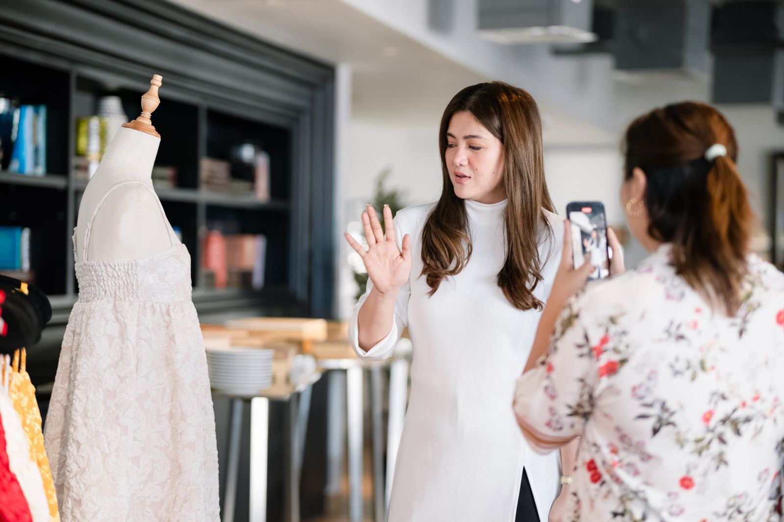 Guests chatting by the collection's rails