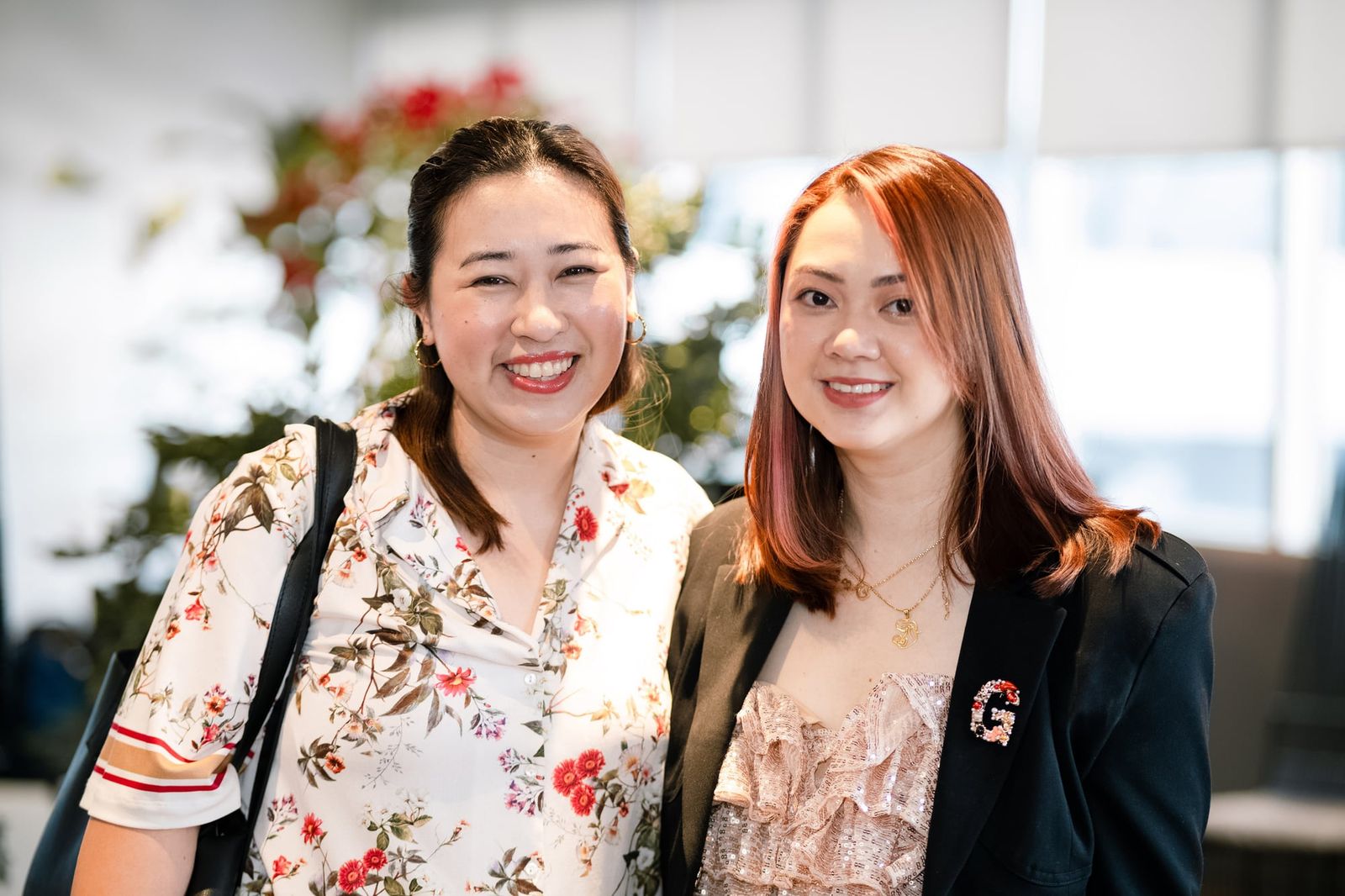 Two guests smiling at the launch