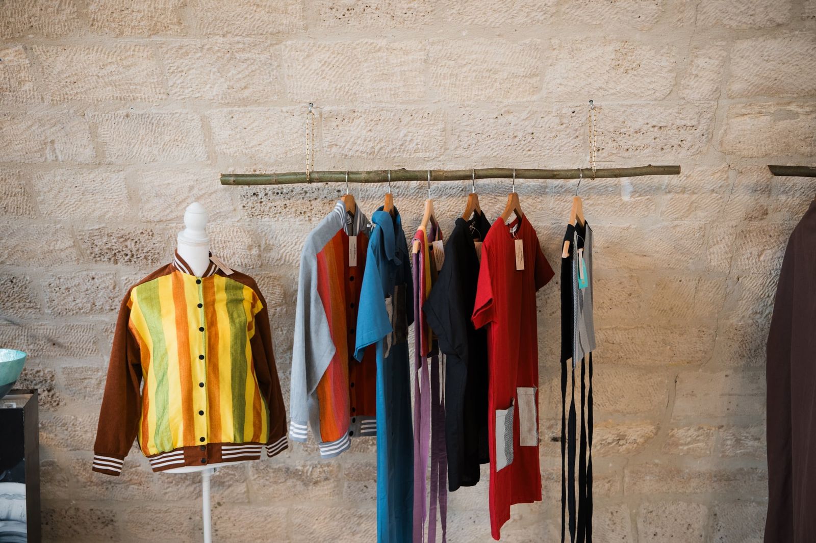 CHICKS x Get Spotted pieces on the rail at Ithemba, with the striped hablon Mercedes Bomber Jacket on a stand
