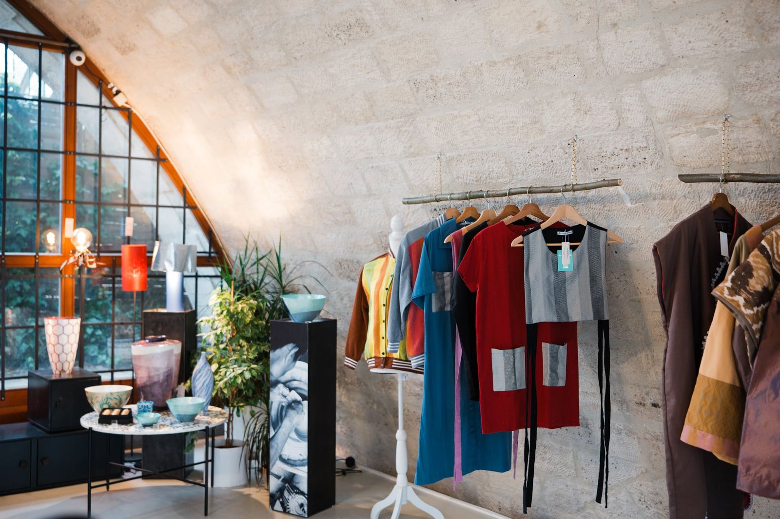 The CHICKS x Get Spotted collection in the arched Ithemba showroom, by the big window