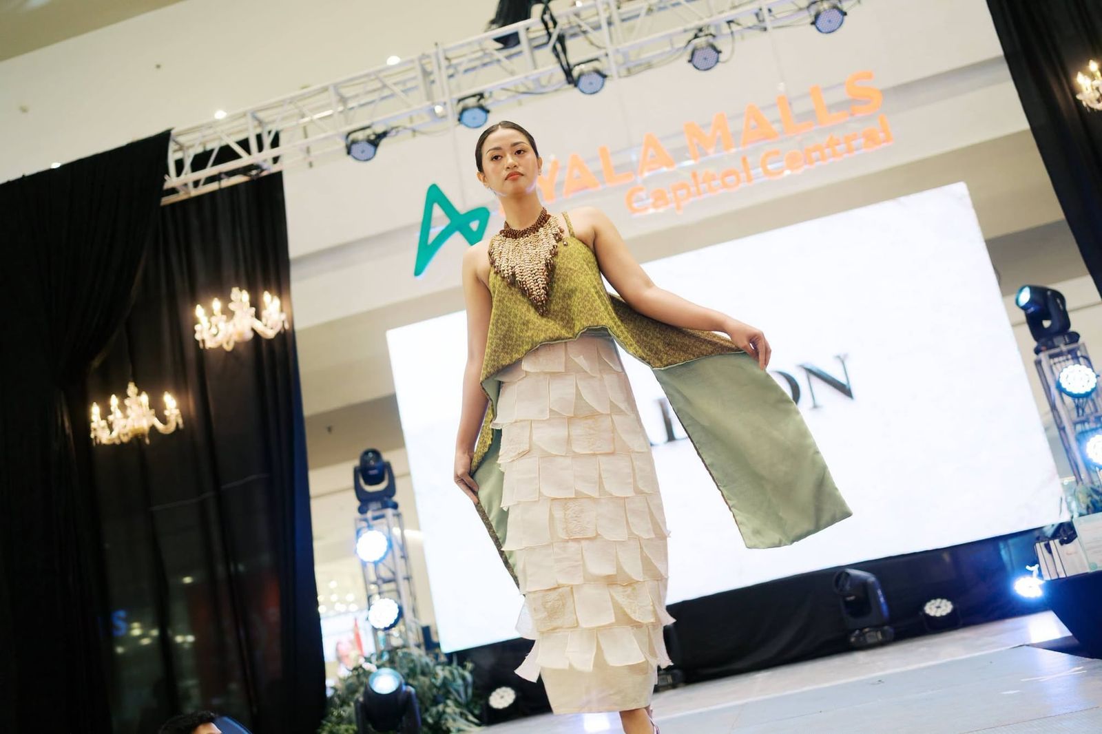 Model in a ruffled skirt and handwoven top at the Pamana fashion show