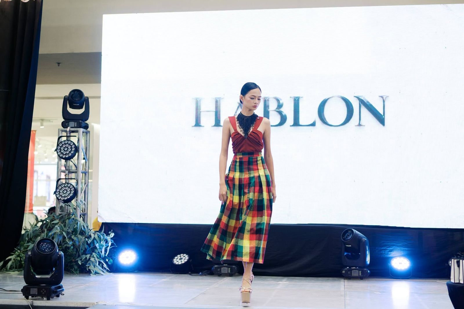 Model in a hablon plaid dress at the Pamana fashion show, Kasalan 2026