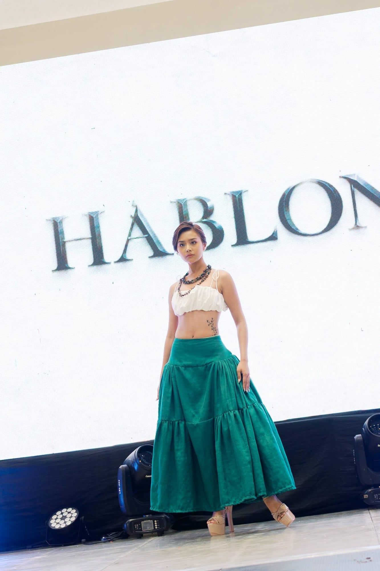 Model in a green tiered skirt at the Pamana fashion show