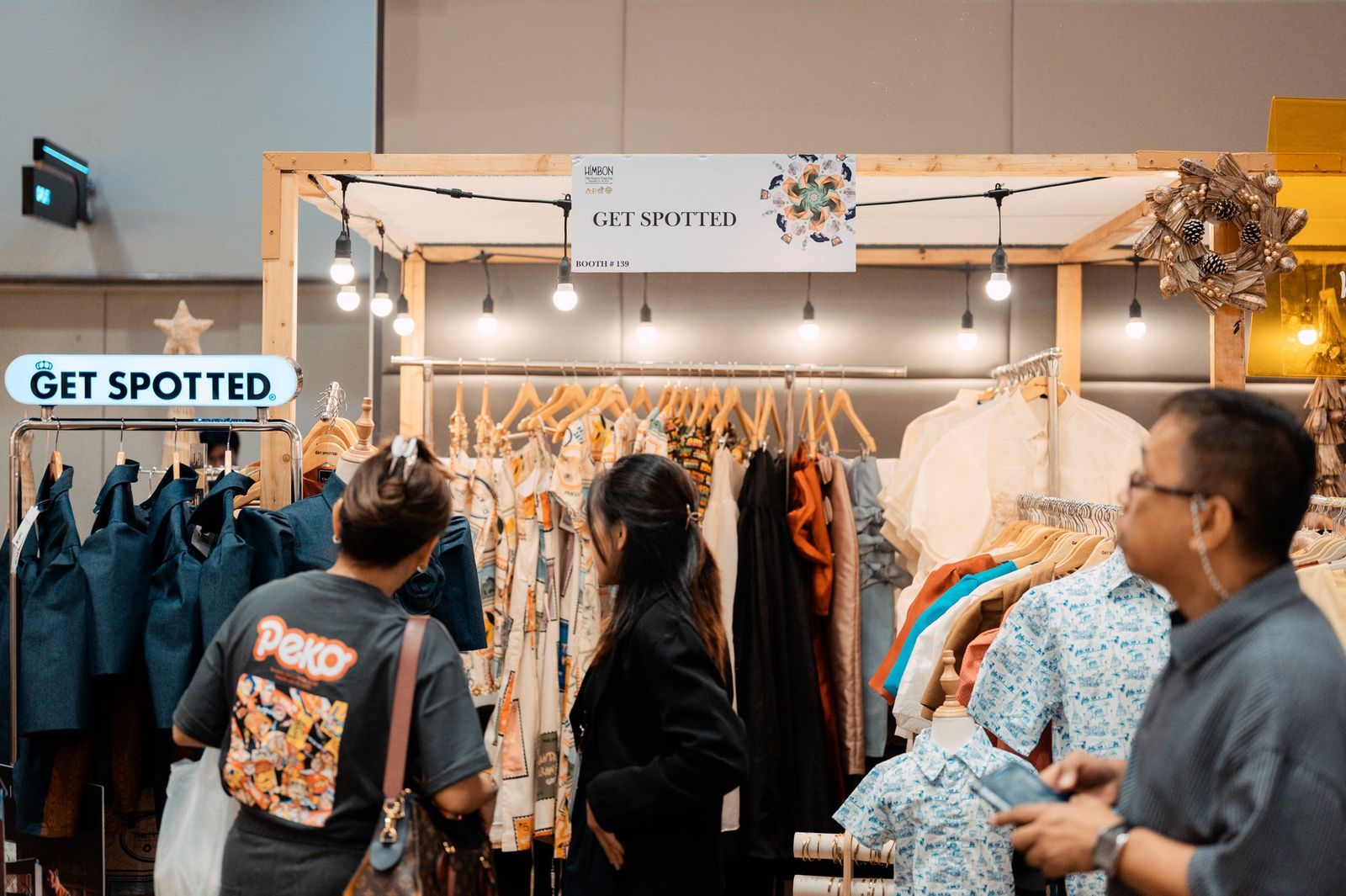 Shoppers browsing the Get Spotted booth at Himbon, Negros Trade Fair 2025