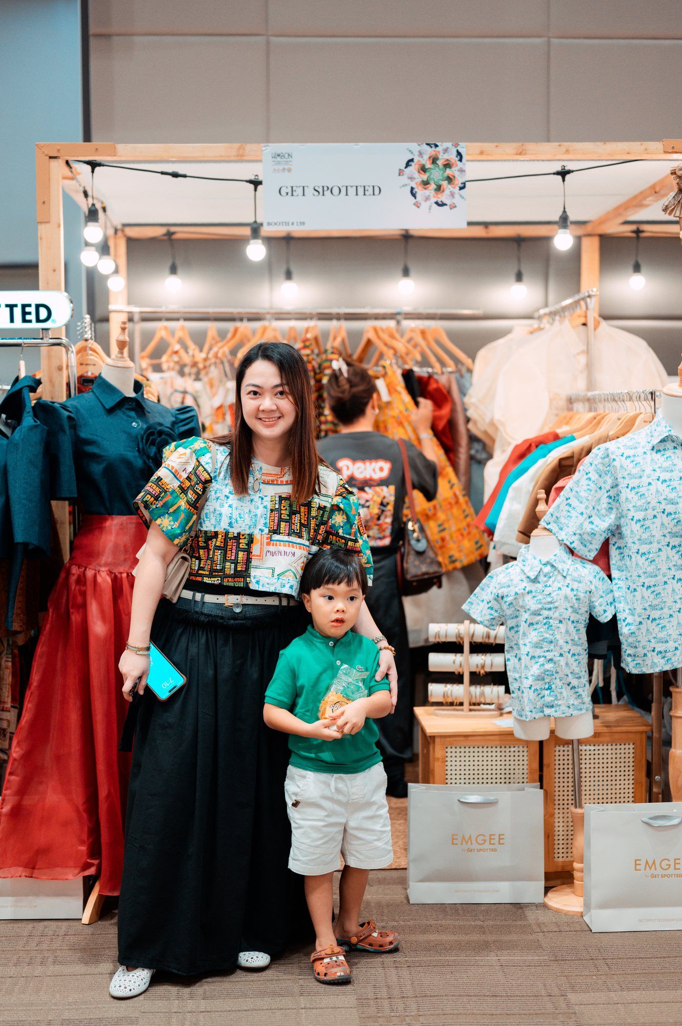 Family photo at the Get Spotted booth, Negros Trade Fair 2025