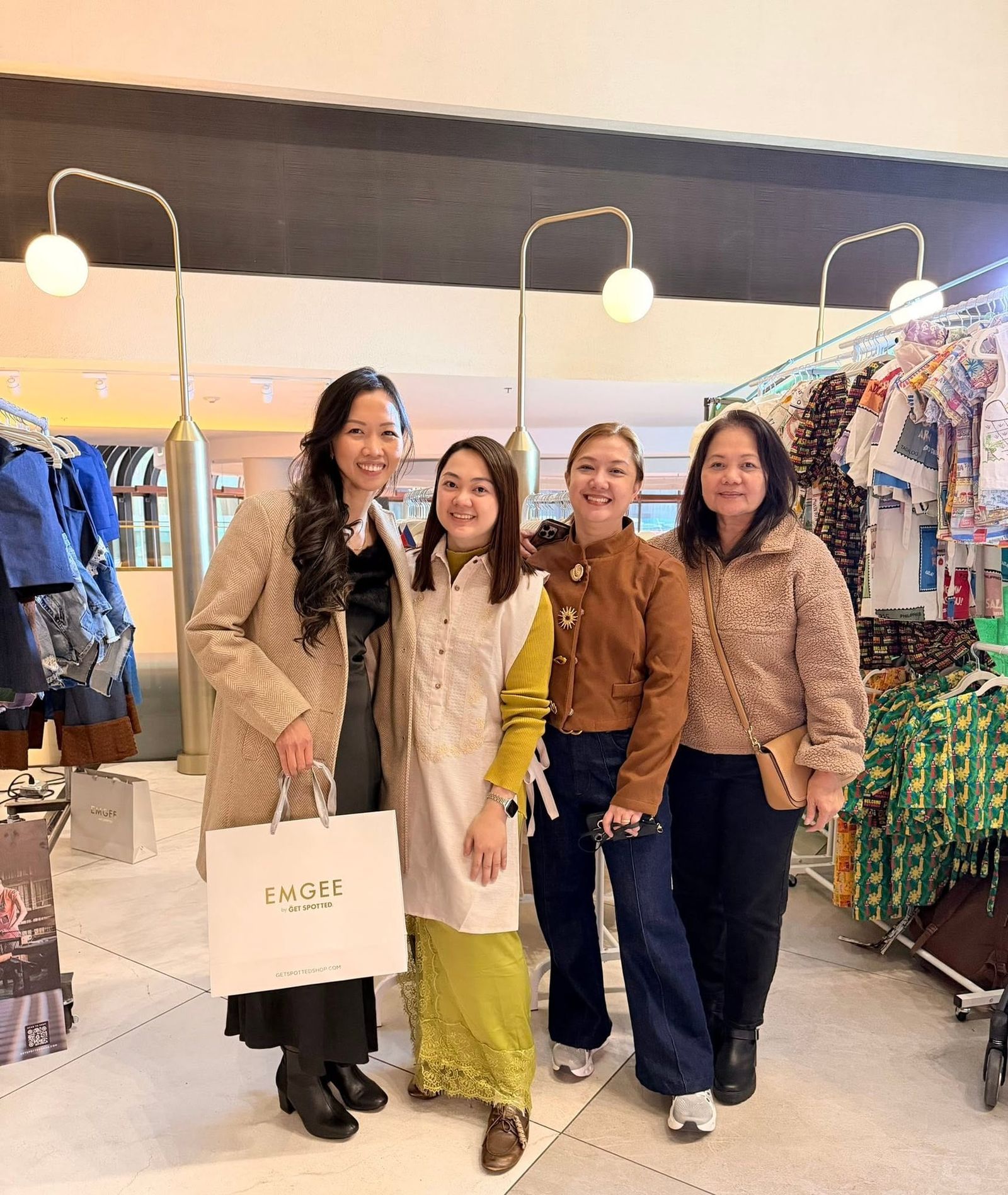 Shoppers with EMGEE bags at the Get Spotted booth, YAMAN New York