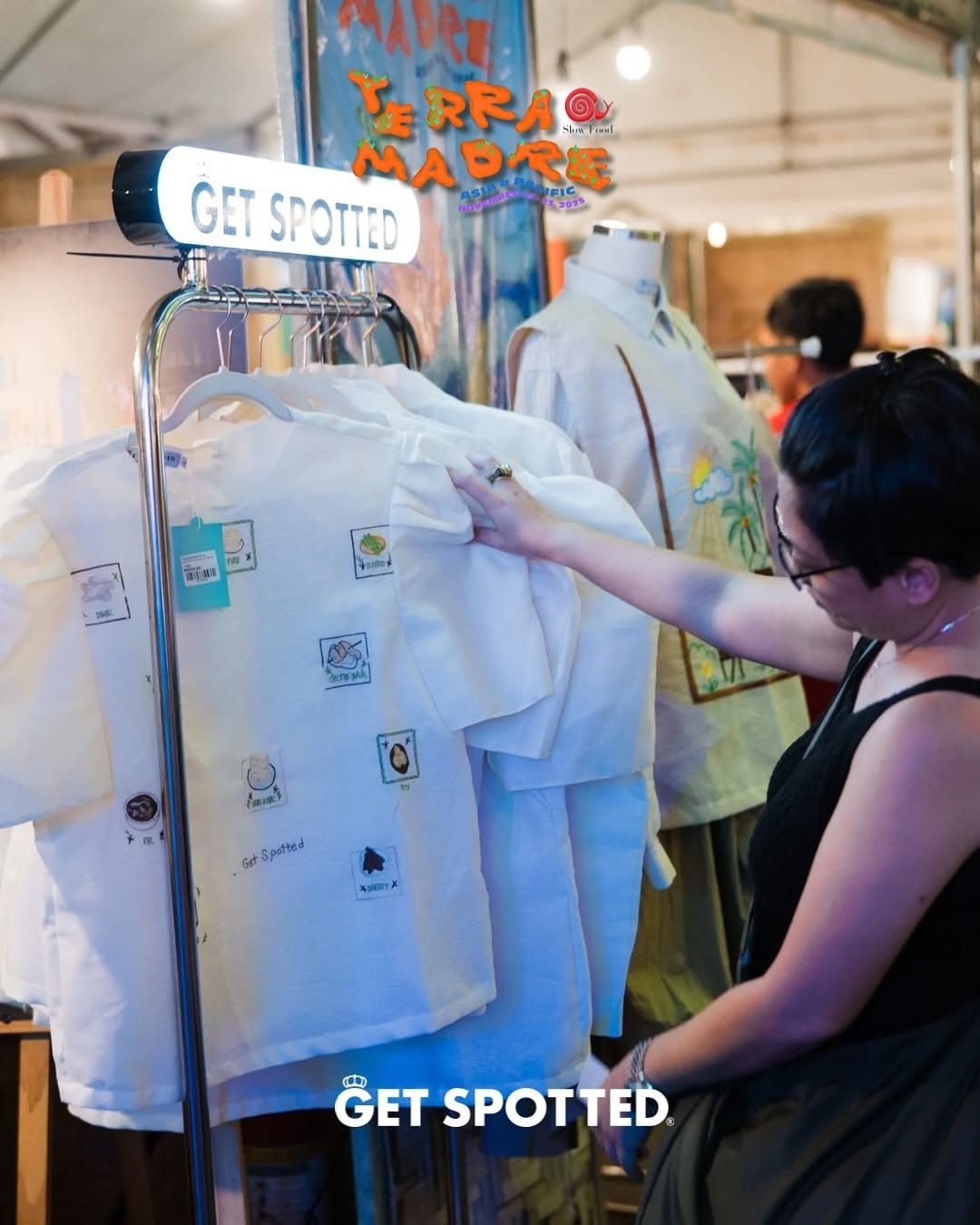A shopper browsing barong at the Get Spotted booth