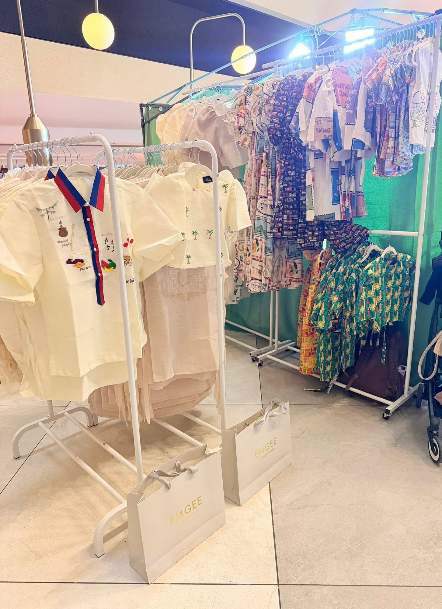 CHICKS x Get Spotted racks and EMGEE shopping bags at the YAMAN booth